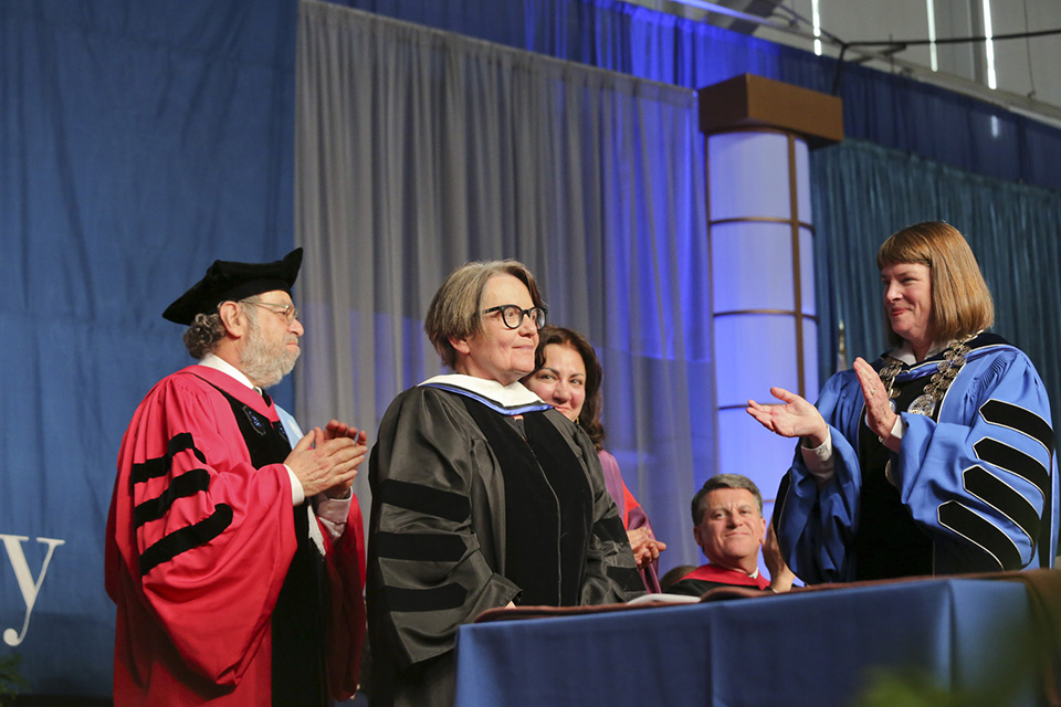 An honorary degree is conferred upon Agnieszka Holland, a Golden Globe-winning director. 