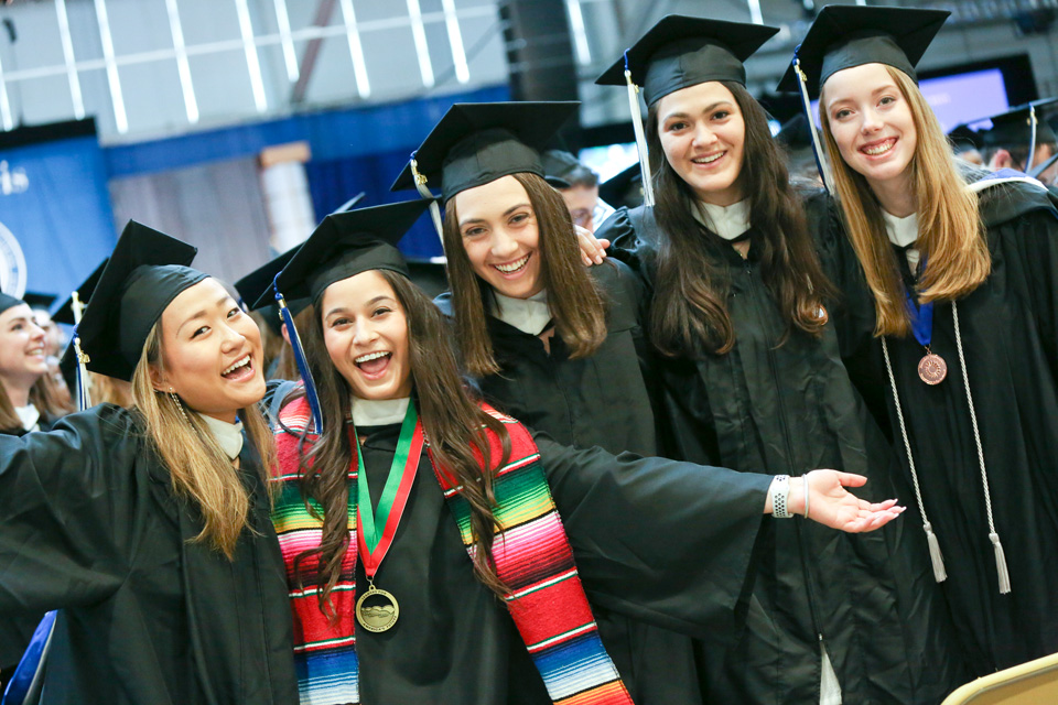 Happy students excited about commencement