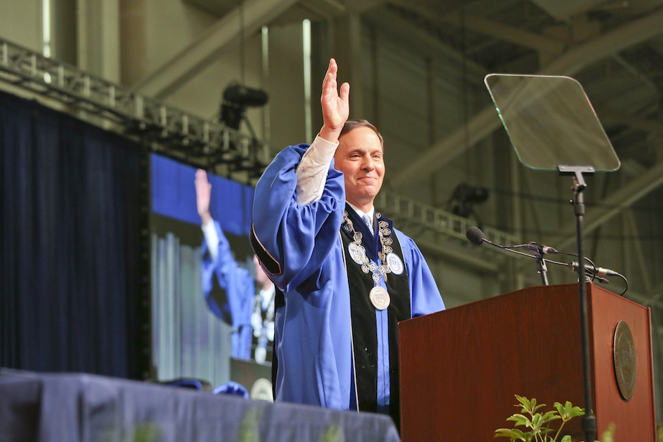 President Ron Liebowitz waves to the Class of 2022