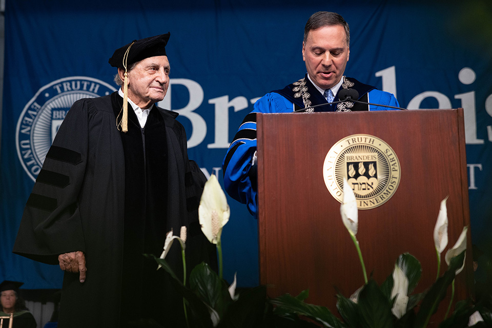 Don Soffer looks on as President Liebowitz presents him with an honorary degree