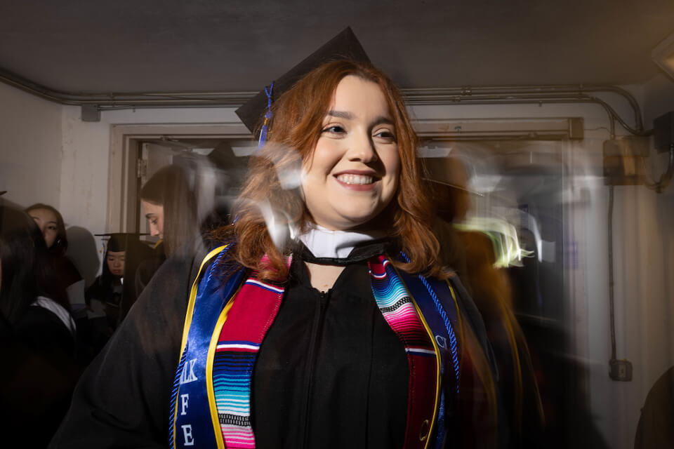 Elizabeth Salas ’23 gets ready to walk into the ceremony.