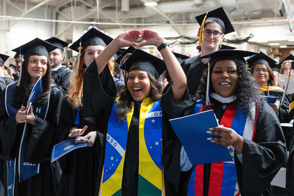 Students revel in the Commencement excitement shared among peers.