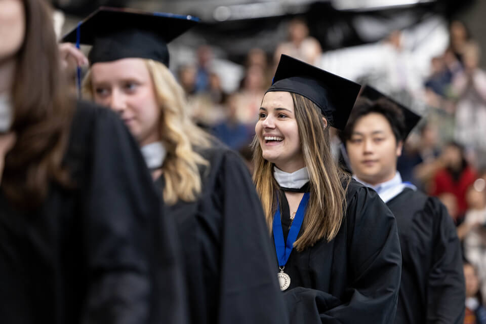 Students entered the Gosman Center for the undergraduate ceremony.