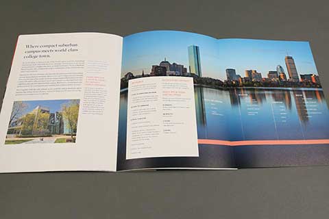 Spread in the International Business School viewbook showing a photo of the Boston skyline