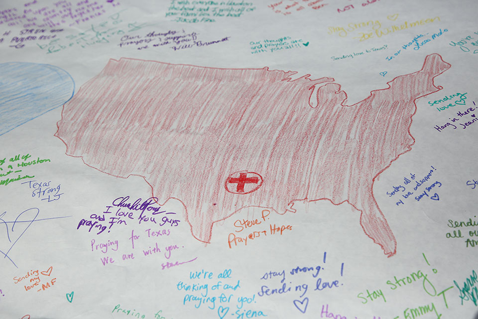 Drawing of the United States with positive messages of support written in crayon