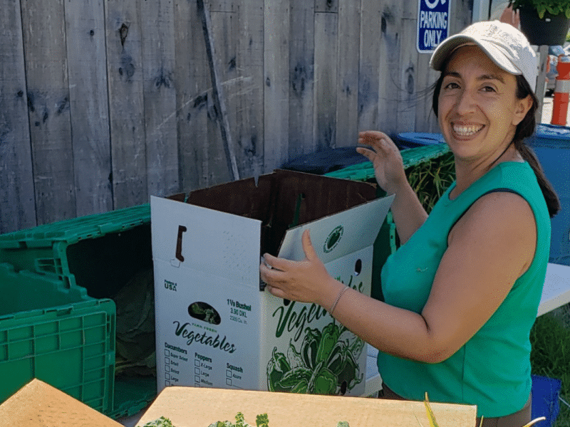 WFCF volunteer packs up produce