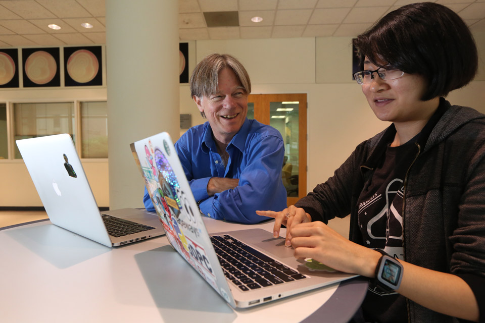 Professor Tim Hickey with a female student