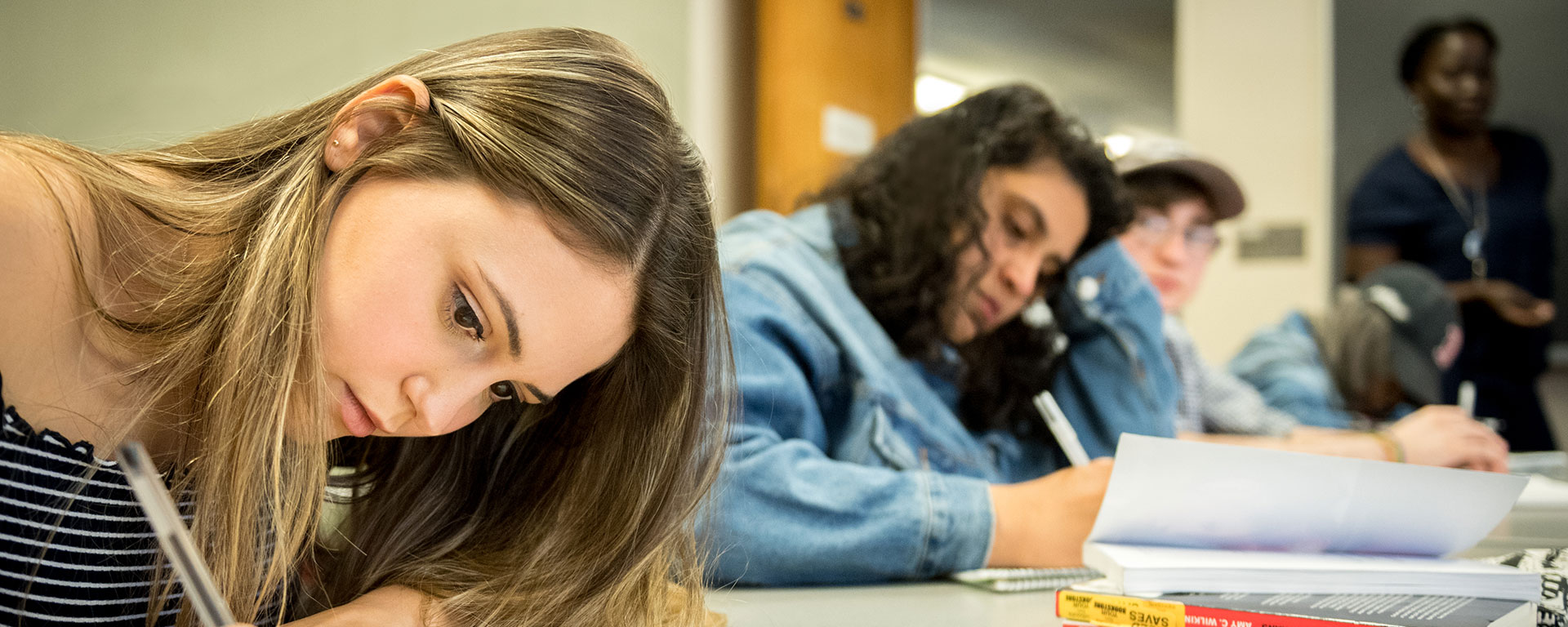 Students taking notes in class