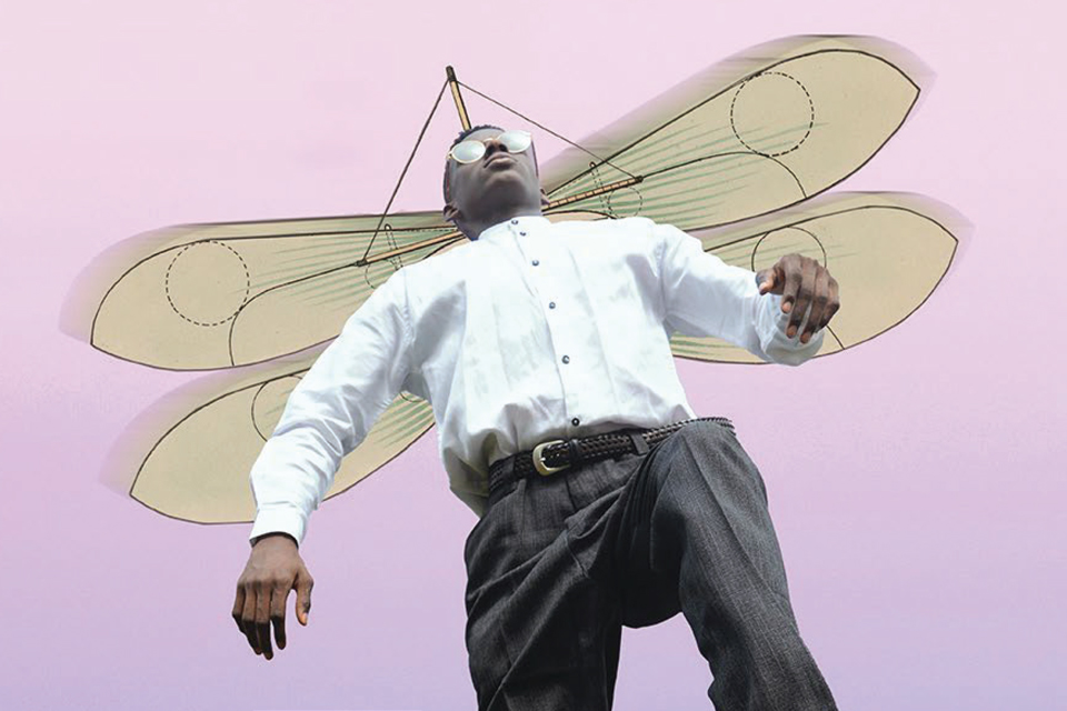 Pictured from below of a figure wearing slacks and a white button down with wings on their back shirt stepping