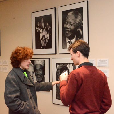 Cast students discuss photo exhibit