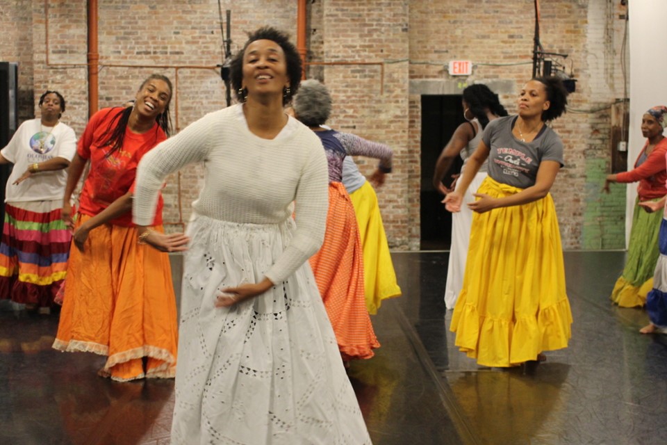 Group of female dancers in long skirts