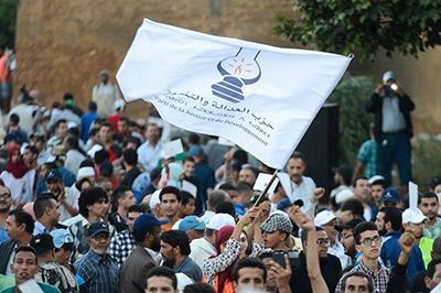 Demonstrators holding a banner