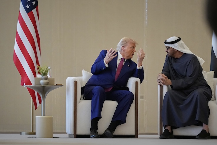 President Donald Trump and UAE President Sheikh Mohammed bin Zayed Al Nahyan talk during a welcome ceremony at Abu Dhabi International Airport on May 15, 2025.