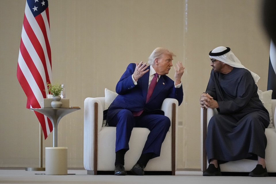 President Donald Trump and UAE President Sheikh Mohammed bin Zayed Al Nahyan talk during a welcome ceremony at Abu Dhabi International Airport.