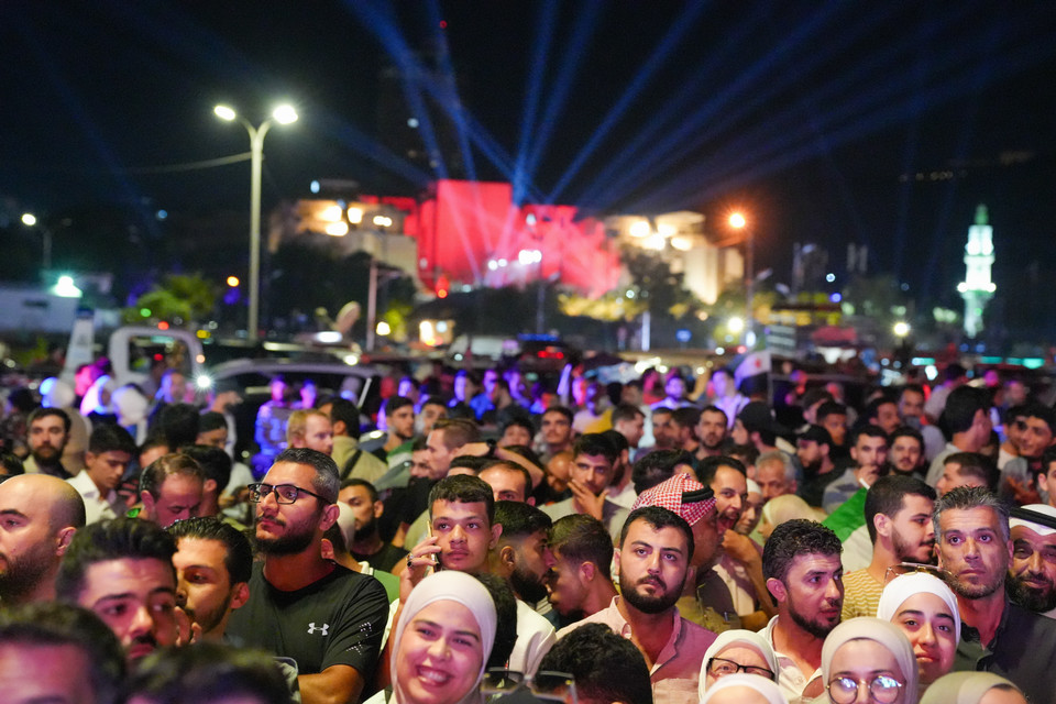 Syrians gather in Damascus to watch President Ahmad Al-Sharaa's UN speech on September 24, 2025