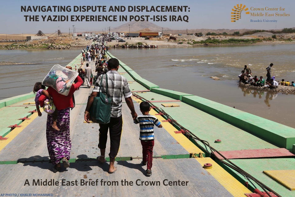 Displaced Yazidis cross the Iraq-Syria border at Feeshkhabour border point, northern Iraq, Aug. 10, 2014. 