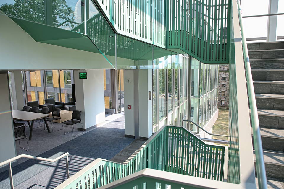 Staircase and study spaces inside Skyline residence Hall