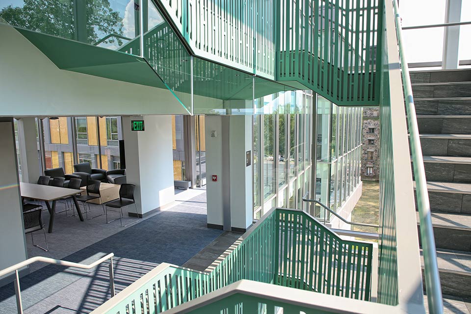 Staircase and study spaces inside Skyline residence Hall