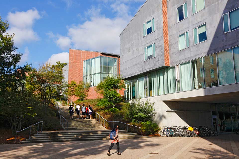 Exterior of The Village with students walking around