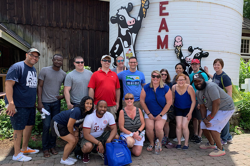Dean of Students staff members smiling outdoors