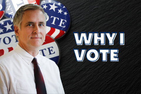 Professor Dan Kryder standing next to the words Why I Vote with VOTE buttons  in the background