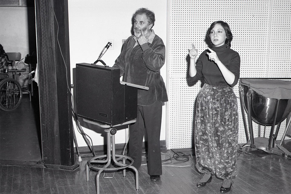 Disability Awareness Day 1983 photo, showing Irv Zola with member of the theater company