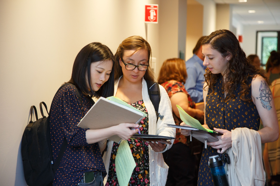 students looking at their notes