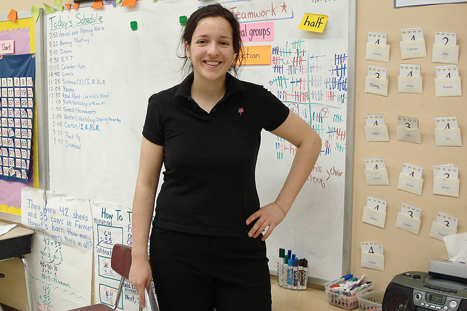 Efrat Kussell stands in her elementary school classroom