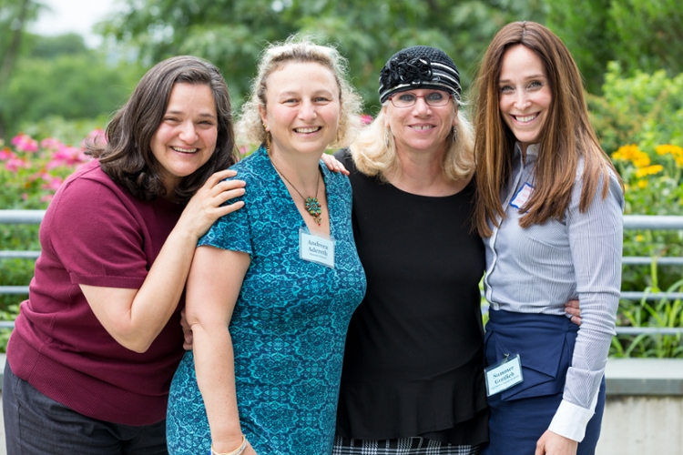 four teacher leaders smiling