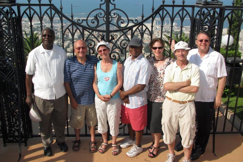 People posing in front of a gate in Israel