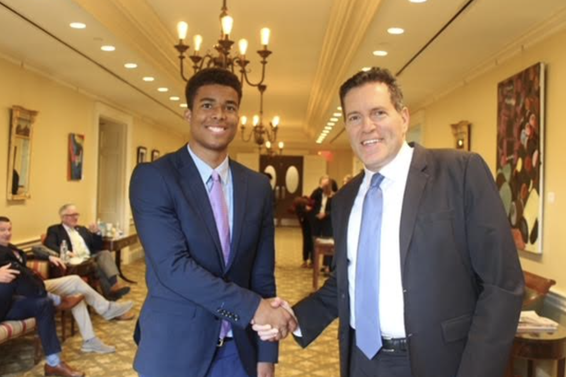 ENACT Corps intern shaking hands and smiling for the camera with Senator Barry Finegold