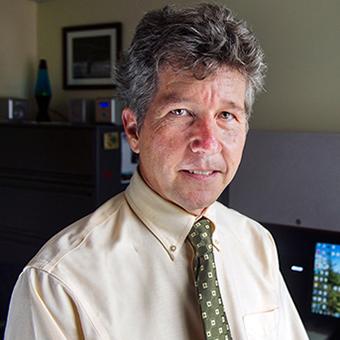 Headshot of Christopher Plein