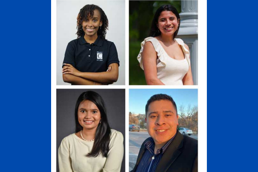 4 student delegates looking at the camera smiling