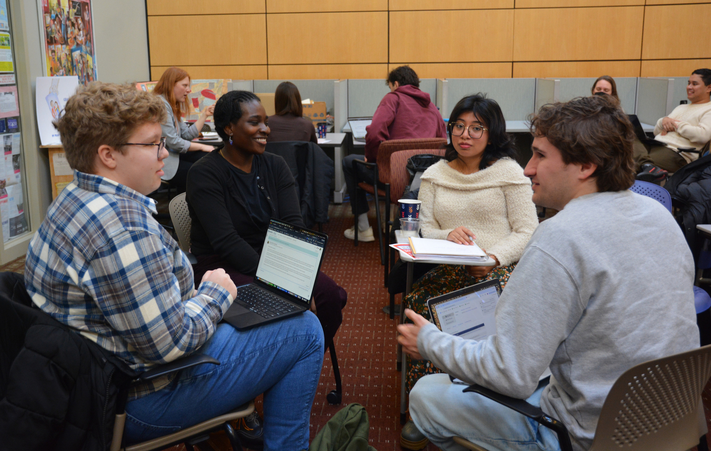 Students at ENACT Advocacy Day meeting with the advocates in small groups.