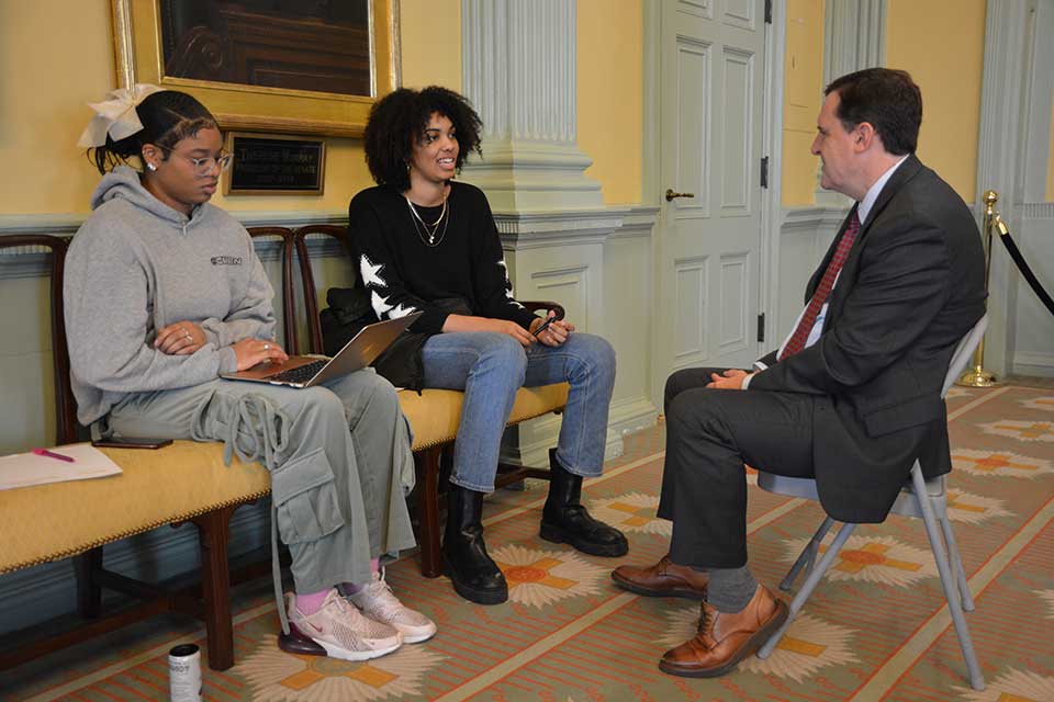 Senator Sal DiDomenico, Representative James O’Day, and Representative Jay Livingstone discuss legislation with Brandeis students