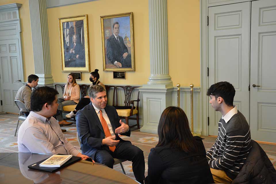 Senator Sal DiDomenico, Representative James O’Day, and Representative Jay Livingstone discuss legislation with Brandeis students
