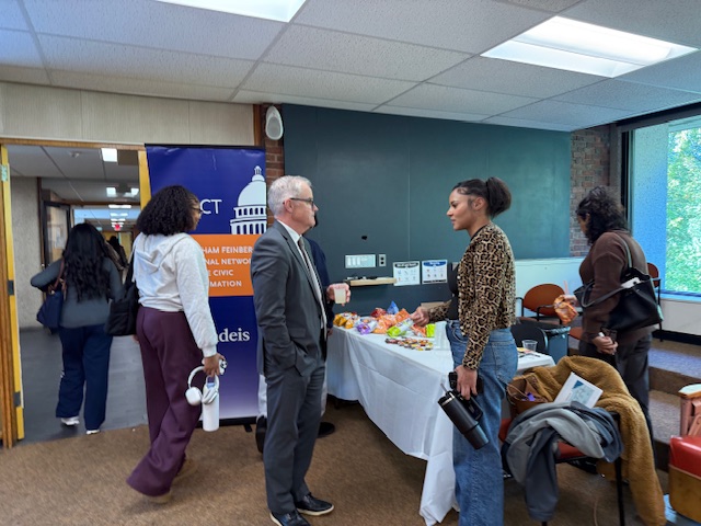 Representative Stanley speaks with a student