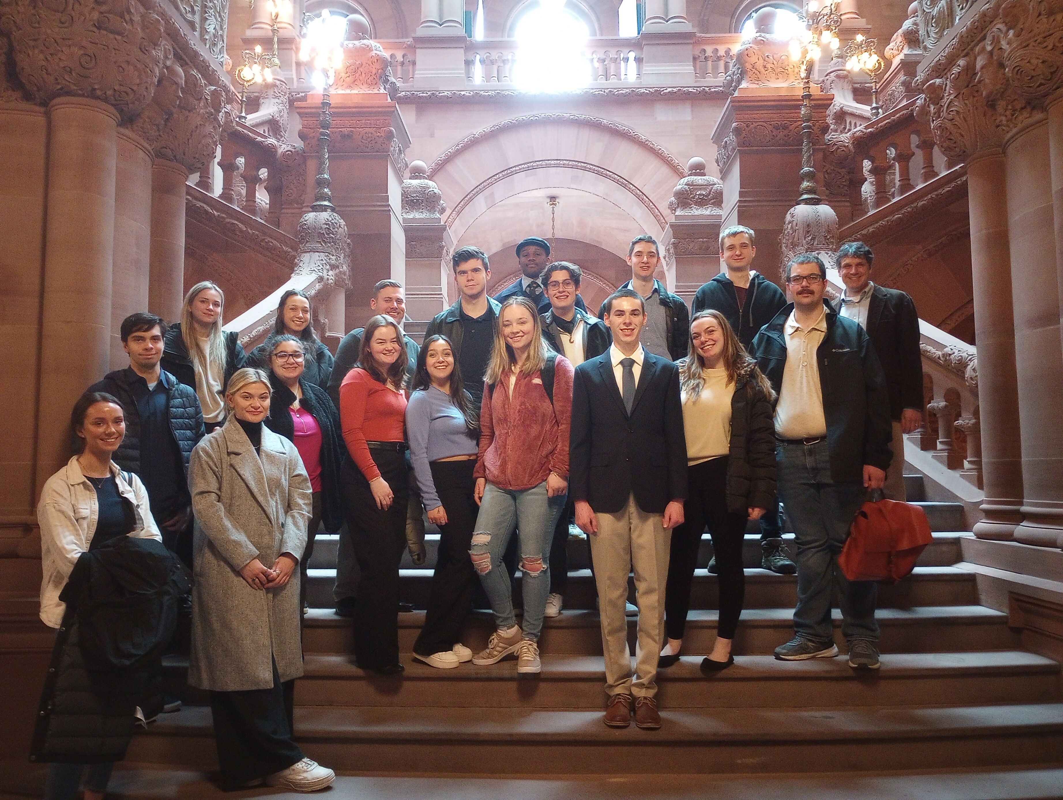  ENACT Faculty Fellow Daniel Lewis (at left) with his Siena College ENACT students touring the New York State Capitol Building in 2023.
