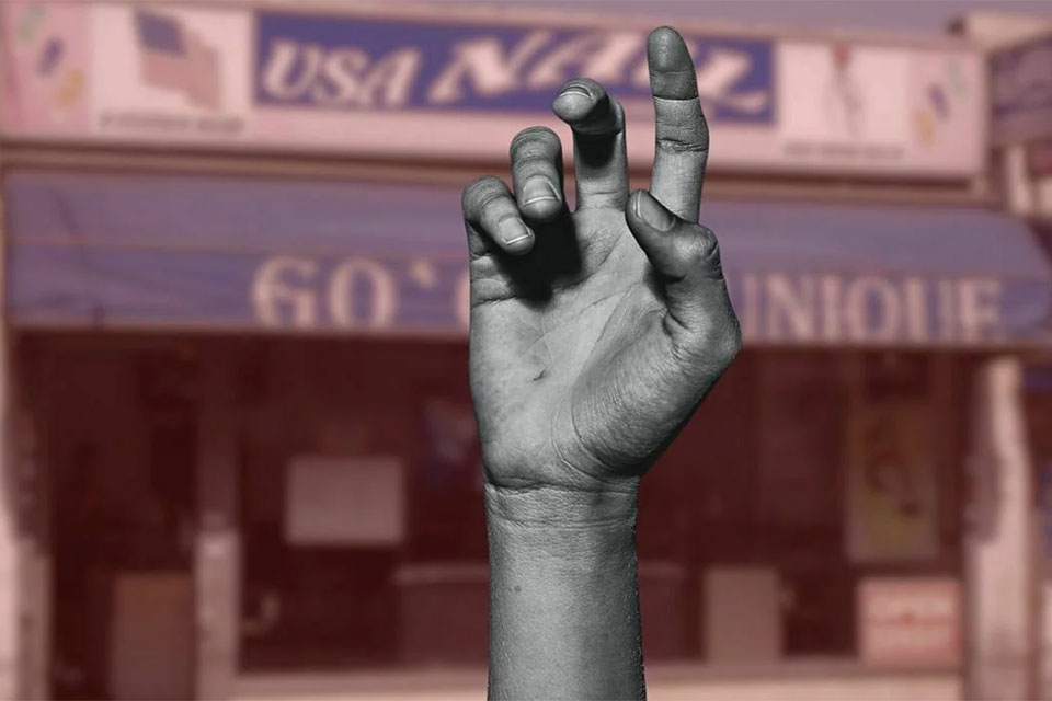 storefront in background with a graphic of a hand reaching up in front