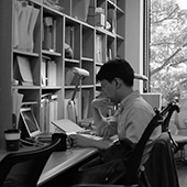 Sungkyung Cho at a desk