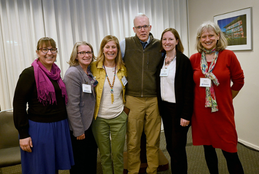 Bill Mckibben speaks into a podium microphone