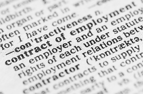 closeup of dictionary definition of "employment contract."