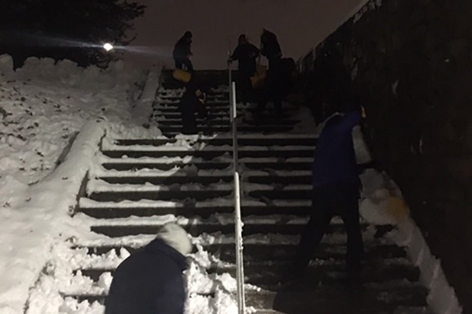 Shoveling Rabb stairs at night