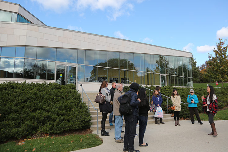 Current students at Brandeis warmly guide admission visitors on an immersive campus tour, sharing personal experiences and highlighting favorite Brandeis gems