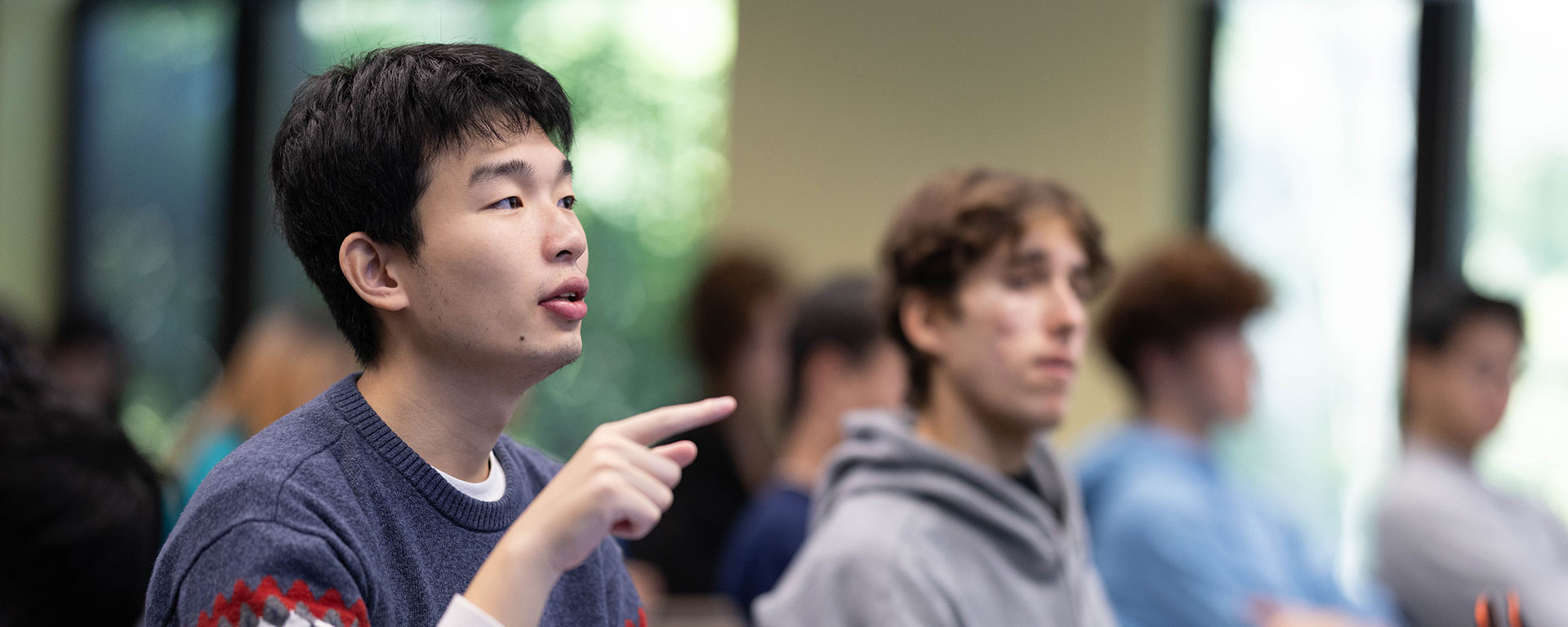 A student speaks during a class
