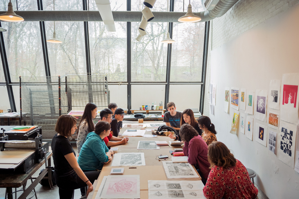 Students taking a printmaking class in the Goldman Schwartz Studio Building