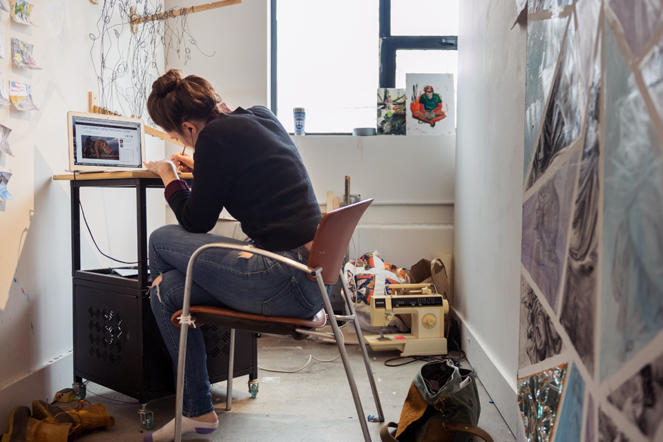 Student working in her studio in Epstein