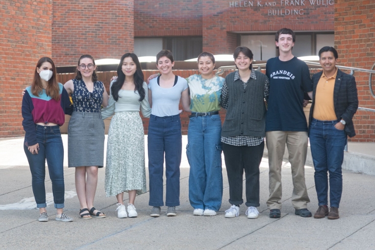 Pride Reps pose outside Usdan Student Center