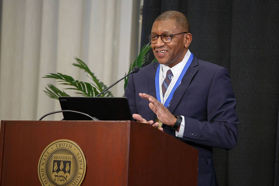 Howard C. Stevenson speaking at a podium