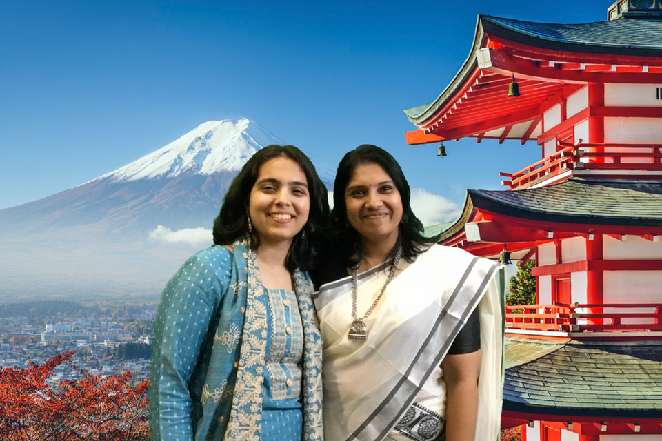 Global fellows standing in front of a green screen showing Japan